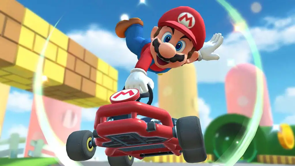 Tour di Mario Kart – Come guadagnare un punteggio di 7000 o superiore usando un pilota che indossa maniche corte Tour di Mario Kart - Come guadagnare un punteggio di 7000 o superiore usando un pilota che indossa maniche corte