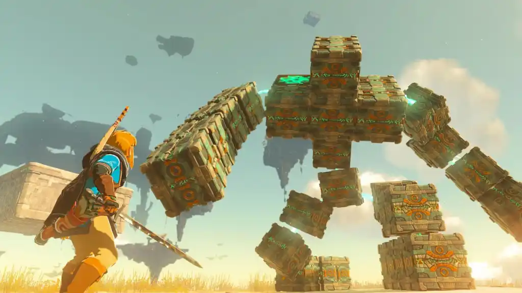 Link che combatte contro un boss di pietra in Tears of the Kingdom
