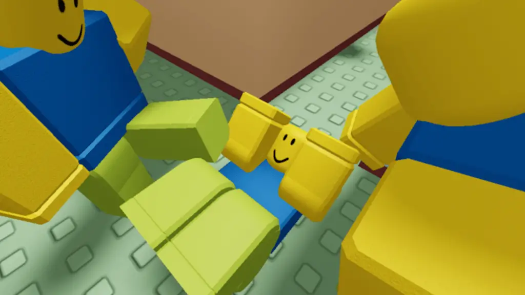 Due Roblox "niubbi" prendi a calci un terzo nabbo mentre è a terra. Tuttavia, è tutto molto divertente.